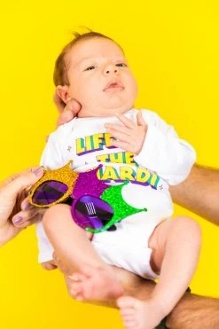 Fringe Co Life Of The Mardi Baby Onesie